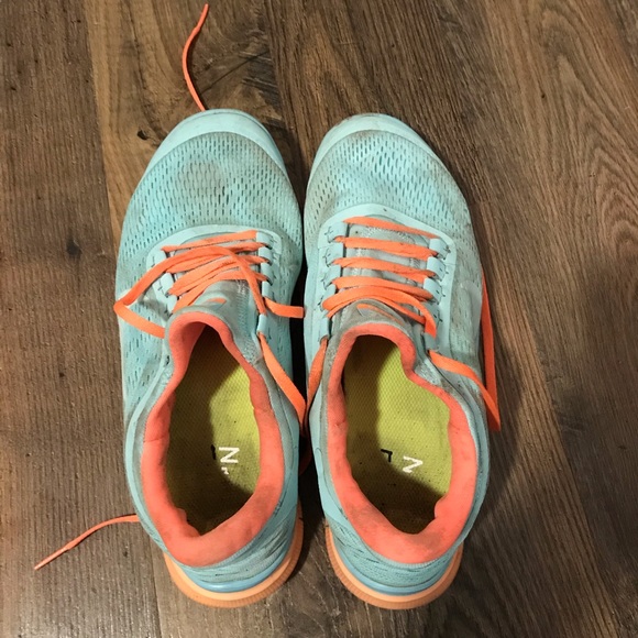 Women's well worn Nike running gym shoes sneakers